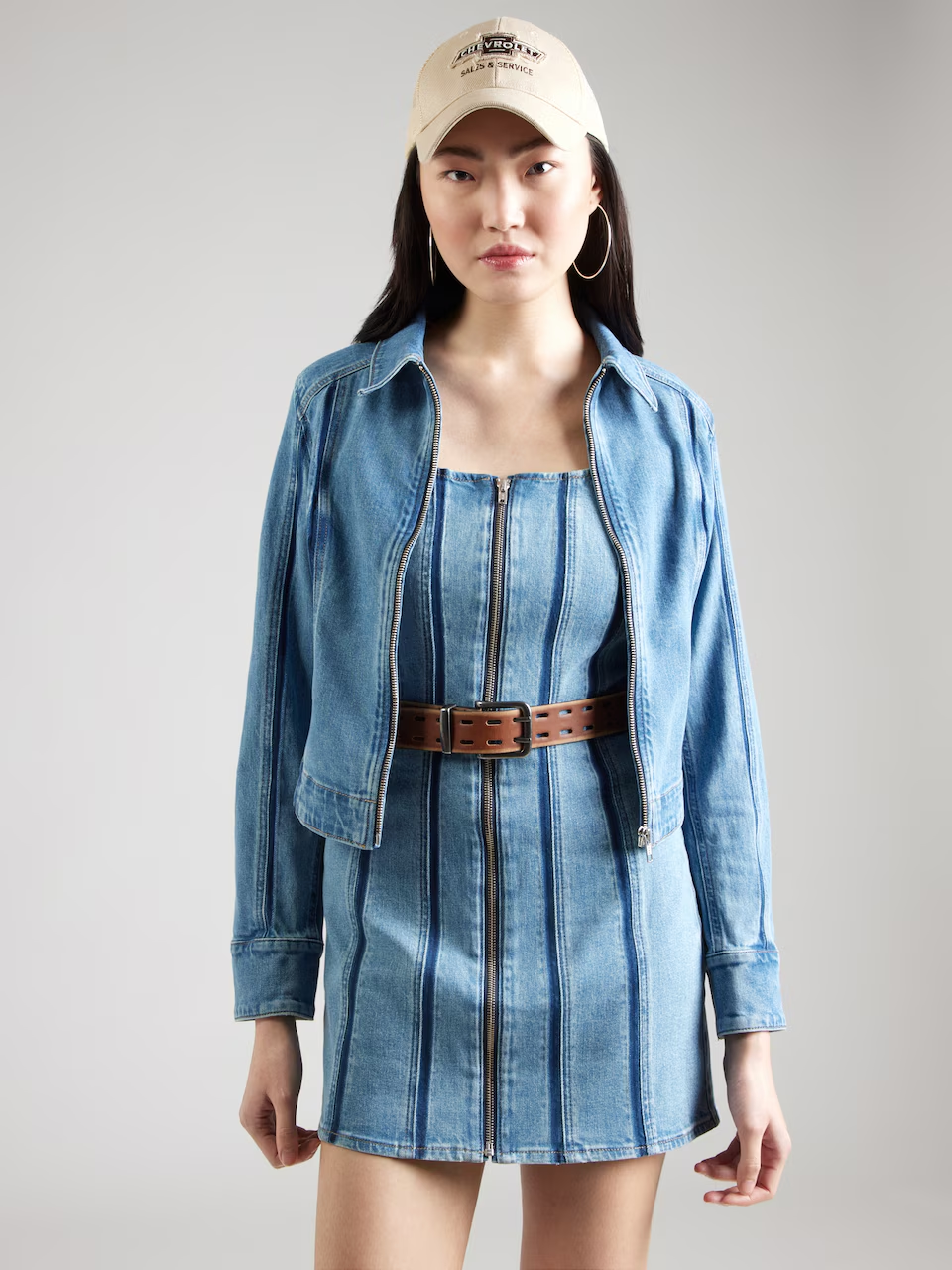 Model wearing blue Levi’s Shadow Seamed denim jacket