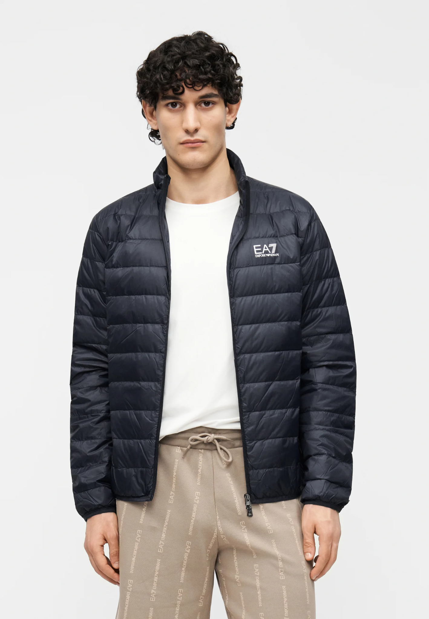 EA7 Emporio Armani navy down jacket worn by a model