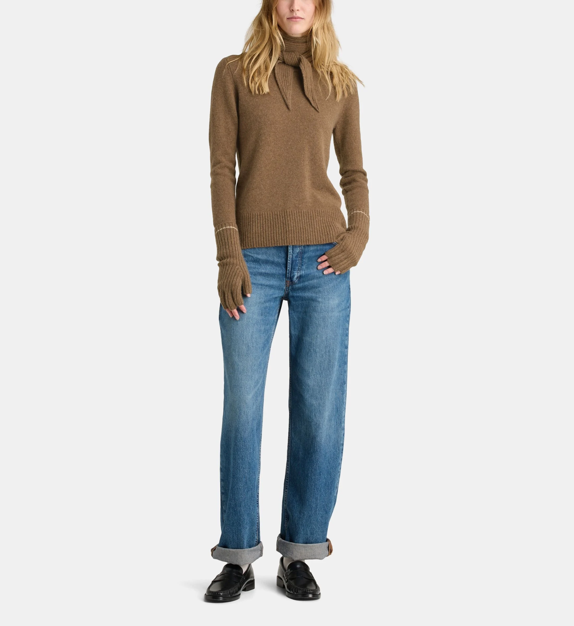 Model wearing a brown Sandrine Kiberlain cashmere sweater