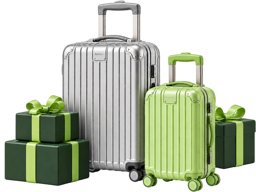 Two suitcases with wrapped gift boxes