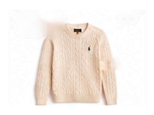 A cream cable knit sweater